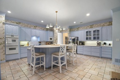 Located in the prestigious Hollytree neighborhood in Tyler, this on Hollytree Country Club in Texas - for sale on GolfHomes.com, golf home, golf lot