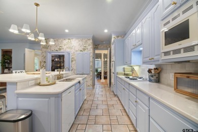 Located in the prestigious Hollytree neighborhood in Tyler, this on Hollytree Country Club in Texas - for sale on GolfHomes.com, golf home, golf lot