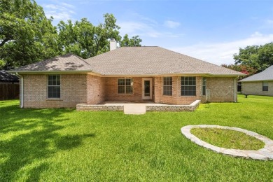 Don't miss this meticulously maintained, two-owner home in the on Pecan Plantation Country Club in Texas - for sale on GolfHomes.com, golf home, golf lot