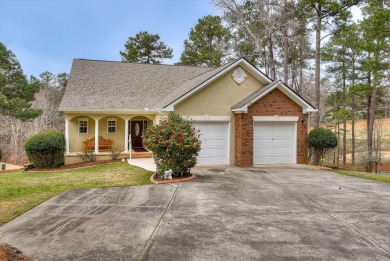 Dream home on the green, fairway views and Lake Thurmond breezes on Monticello Golf Club At Savannah Lakes in South Carolina - for sale on GolfHomes.com, golf home, golf lot