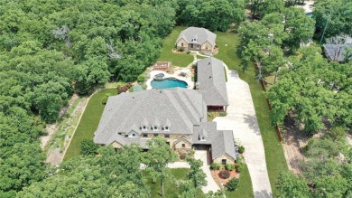 Welcome to this breathtaking 3-acre estate, nestled in the heart on Oak Creek Country Club in Texas - for sale on GolfHomes.com, golf home, golf lot
