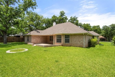 Don't miss this meticulously maintained, two-owner home in the on Pecan Plantation Country Club in Texas - for sale on GolfHomes.com, golf home, golf lot