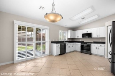 This COMPLETELY RENOVATED townhome is located in Sunset Greens on CasaBlanca Resort and Casino in Nevada - for sale on GolfHomes.com, golf home, golf lot