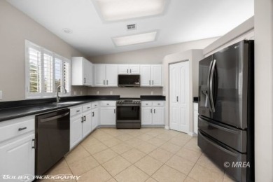 This COMPLETELY RENOVATED townhome is located in Sunset Greens on CasaBlanca Resort and Casino in Nevada - for sale on GolfHomes.com, golf home, golf lot
