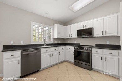 This COMPLETELY RENOVATED townhome is located in Sunset Greens on CasaBlanca Resort and Casino in Nevada - for sale on GolfHomes.com, golf home, golf lot