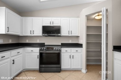 This COMPLETELY RENOVATED townhome is located in Sunset Greens on CasaBlanca Resort and Casino in Nevada - for sale on GolfHomes.com, golf home, golf lot
