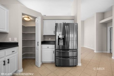 This COMPLETELY RENOVATED townhome is located in Sunset Greens on CasaBlanca Resort and Casino in Nevada - for sale on GolfHomes.com, golf home, golf lot