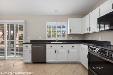 This COMPLETELY RENOVATED townhome is located in Sunset Greens on CasaBlanca Resort and Casino in Nevada - for sale on GolfHomes.com, golf home, golf lot