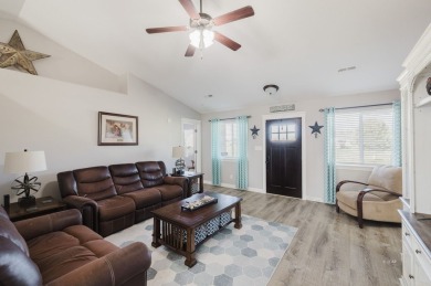 This stunning 4 bed, 2 bath home sits on a  1-acre corner lot on Spring Creek Golf Course in Nevada - for sale on GolfHomes.com, golf home, golf lot