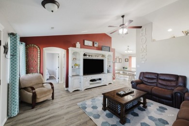 This stunning 4 bed, 2 bath home sits on a  1-acre corner lot on Spring Creek Golf Course in Nevada - for sale on GolfHomes.com, golf home, golf lot