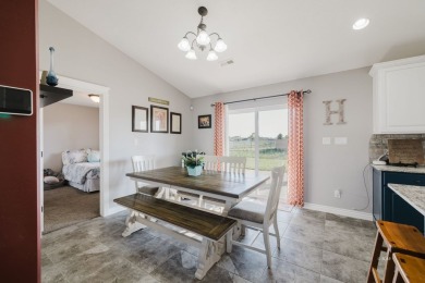 This stunning 4 bed, 2 bath home sits on a  1-acre corner lot on Spring Creek Golf Course in Nevada - for sale on GolfHomes.com, golf home, golf lot