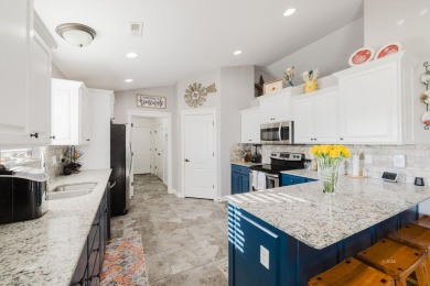 This stunning 4 bed, 2 bath home sits on a  1-acre corner lot on Spring Creek Golf Course in Nevada - for sale on GolfHomes.com, golf home, golf lot