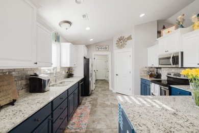 This stunning 4 bed, 2 bath home sits on a  1-acre corner lot on Spring Creek Golf Course in Nevada - for sale on GolfHomes.com, golf home, golf lot