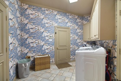 Located in the prestigious Hollytree neighborhood in Tyler, this on Hollytree Country Club in Texas - for sale on GolfHomes.com, golf home, golf lot