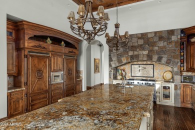 Imagine a Santa Barbara-inspired architectural gem situated on on Superstition Mountain Club - Lost Gold in Arizona - for sale on GolfHomes.com, golf home, golf lot