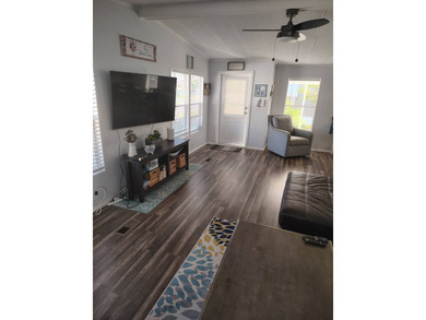 Welcome Home!!! This 2 bedroom 2 bath home is situated on the on Spanish Lakes Country Club in Florida - for sale on GolfHomes.com, golf home, golf lot