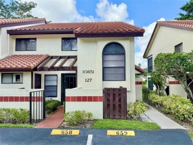 What a Beautiful Lake View this 2-Bedroom, 2-Bathroom Condo has! on Pine Tree Golf Club in Florida - for sale on GolfHomes.com, golf home, golf lot