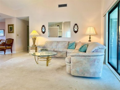 What a Beautiful Lake View this 2-Bedroom, 2-Bathroom Condo has! on Pine Tree Golf Club in Florida - for sale on GolfHomes.com, golf home, golf lot