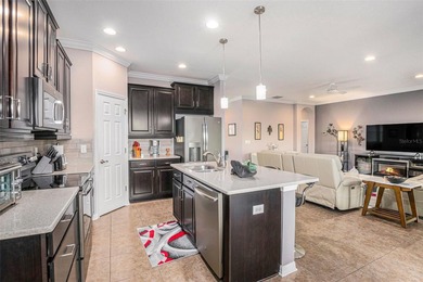 Located directly on the golf course, this sleek and modern home on Tampa Bay Golf and Country Club in Florida - for sale on GolfHomes.com, golf home, golf lot