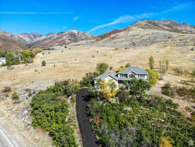 Perched overlooking the Ogden Valley and less than 5-miles from on Wolf Creek Golf Club and Resort in Utah - for sale on GolfHomes.com, golf home, golf lot