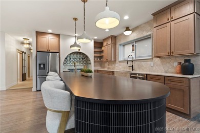 Experience luxury in this stunning 5,500 sq ft home that blends on The Club At Porto Cima in Missouri - for sale on GolfHomes.com, golf home, golf lot