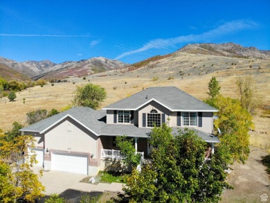 Perched overlooking the Ogden Valley and less than 5-miles from on Wolf Creek Golf Club and Resort in Utah - for sale on GolfHomes.com, golf home, golf lot