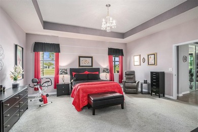 Located directly on the golf course, this sleek and modern home on Tampa Bay Golf and Country Club in Florida - for sale on GolfHomes.com, golf home, golf lot