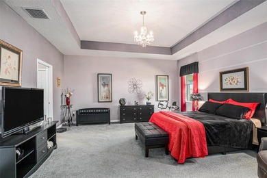 Located directly on the golf course, this sleek and modern home on Tampa Bay Golf and Country Club in Florida - for sale on GolfHomes.com, golf home, golf lot