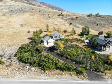 Perched overlooking the Ogden Valley and less than 5-miles from on Wolf Creek Golf Club and Resort in Utah - for sale on GolfHomes.com, golf home, golf lot