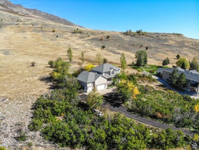 Perched overlooking the Ogden Valley and less than 5-miles from on Wolf Creek Golf Club and Resort in Utah - for sale on GolfHomes.com, golf home, golf lot