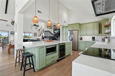 Welcome to this newly renovated luxury lakeside retreat on The Dunes Golf and Tennis Club in Florida - for sale on GolfHomes.com, golf home, golf lot