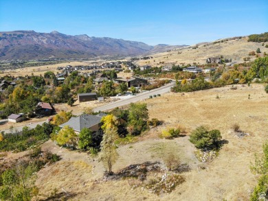 Perched overlooking the Ogden Valley and less than 5-miles from on Wolf Creek Golf Club and Resort in Utah - for sale on GolfHomes.com, golf home, golf lot