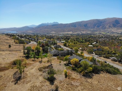 Perched overlooking the Ogden Valley and less than 5-miles from on Wolf Creek Golf Club and Resort in Utah - for sale on GolfHomes.com, golf home, golf lot