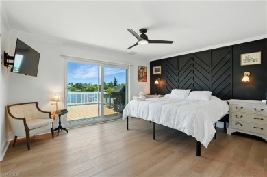 Welcome to this newly renovated luxury lakeside retreat on The Dunes Golf and Tennis Club in Florida - for sale on GolfHomes.com, golf home, golf lot