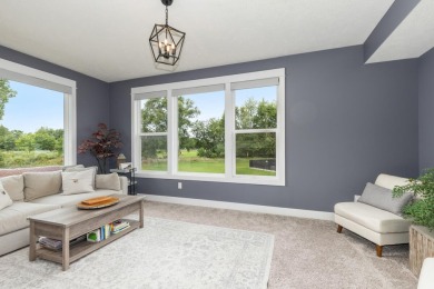 Stunning home in the highly sought-after Macatawa Legends on The Macatwa Legends Golf Course in Michigan - for sale on GolfHomes.com, golf home, golf lot