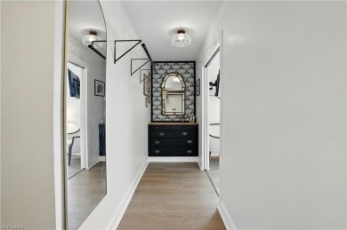 Welcome to this newly renovated luxury lakeside retreat on The Dunes Golf and Tennis Club in Florida - for sale on GolfHomes.com, golf home, golf lot