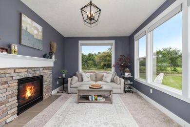 Stunning home in the highly sought-after Macatawa Legends on The Macatwa Legends Golf Course in Michigan - for sale on GolfHomes.com, golf home, golf lot
