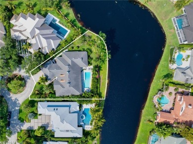 Welcome to your dream one-story lakefront pool home with over on Club at Pelican Bay Golf Course in Florida - for sale on GolfHomes.com, golf home, golf lot