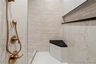 Experience luxury in this stunning 5,500 sq ft home that blends on The Club At Porto Cima in Missouri - for sale on GolfHomes.com, golf home, golf lot