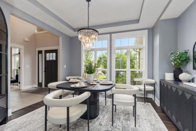 Stunning home in the highly sought-after Macatawa Legends on The Macatwa Legends Golf Course in Michigan - for sale on GolfHomes.com, golf home, golf lot