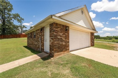Move-in ready  brick home on nearly an acre (two lots) just East on River Valley Golf Course in Arkansas - for sale on GolfHomes.com, golf home, golf lot