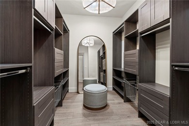 Experience luxury in this stunning 5,500 sq ft home that blends on The Club At Porto Cima in Missouri - for sale on GolfHomes.com, golf home, golf lot