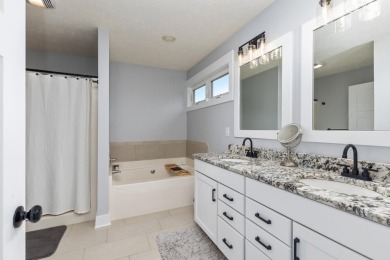 Stunning home in the highly sought-after Macatawa Legends on The Macatwa Legends Golf Course in Michigan - for sale on GolfHomes.com, golf home, golf lot