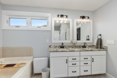 Stunning home in the highly sought-after Macatawa Legends on The Macatwa Legends Golf Course in Michigan - for sale on GolfHomes.com, golf home, golf lot