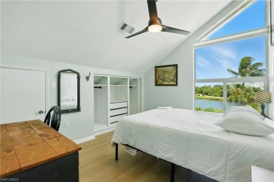 Welcome to this newly renovated luxury lakeside retreat on The Dunes Golf and Tennis Club in Florida - for sale on GolfHomes.com, golf home, golf lot