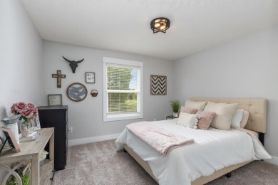 Stunning home in the highly sought-after Macatawa Legends on The Macatwa Legends Golf Course in Michigan - for sale on GolfHomes.com, golf home, golf lot