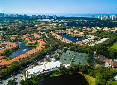 Welcome to your dream one-story lakefront pool home with over on Club at Pelican Bay Golf Course in Florida - for sale on GolfHomes.com, golf home, golf lot