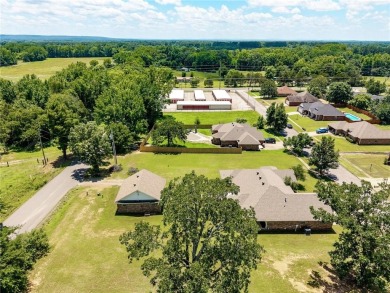 Move-in ready  brick home on nearly an acre (two lots) just East on River Valley Golf Course in Arkansas - for sale on GolfHomes.com, golf home, golf lot