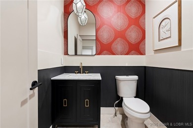 Experience luxury in this stunning 5,500 sq ft home that blends on The Club At Porto Cima in Missouri - for sale on GolfHomes.com, golf home, golf lot