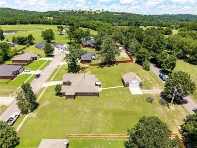 Move-in ready  brick home on nearly an acre (two lots) just East on River Valley Golf Course in Arkansas - for sale on GolfHomes.com, golf home, golf lot